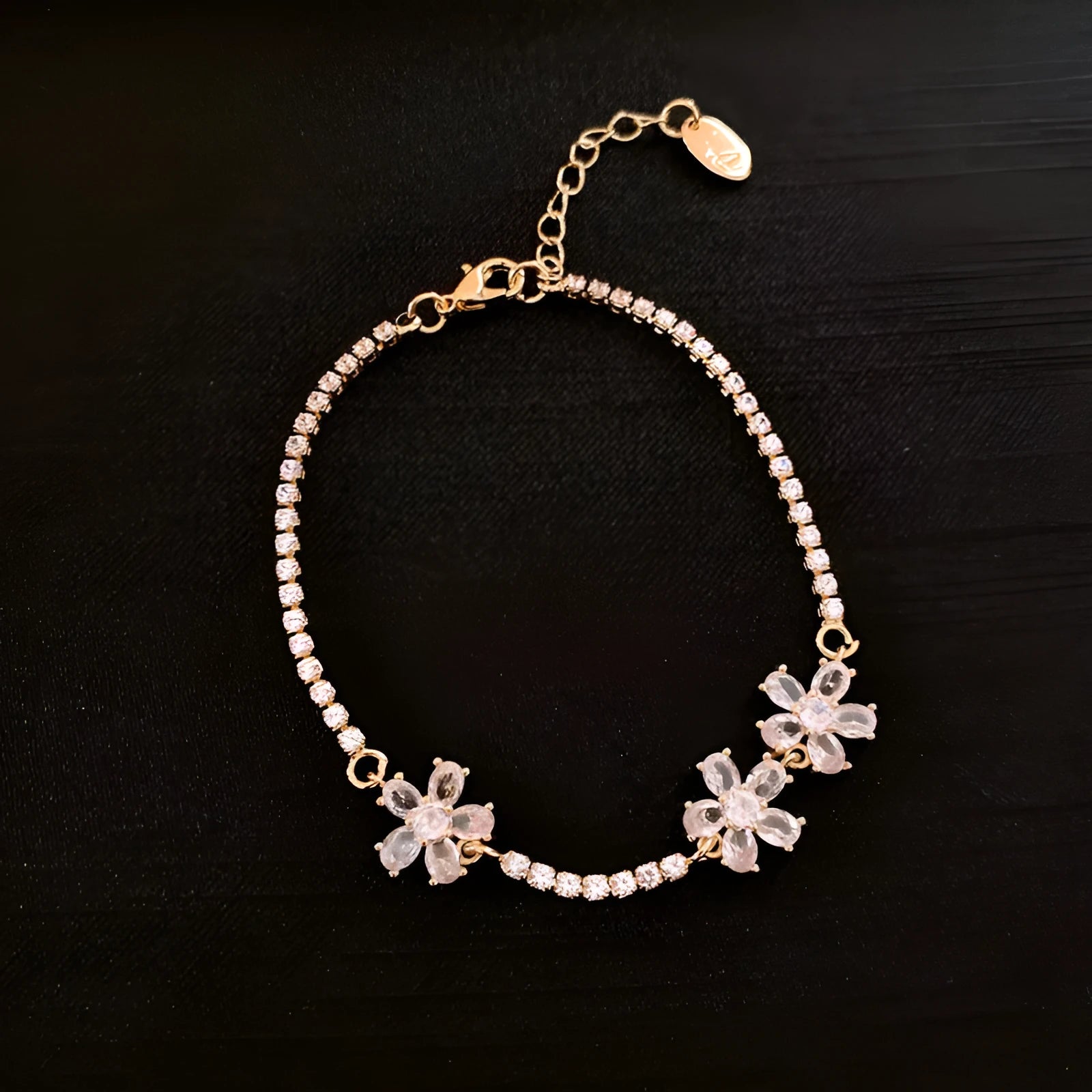 Women's copper bracelet with geometric quadrilateral design and gold-coloured finish featuring inlaid zircon stones