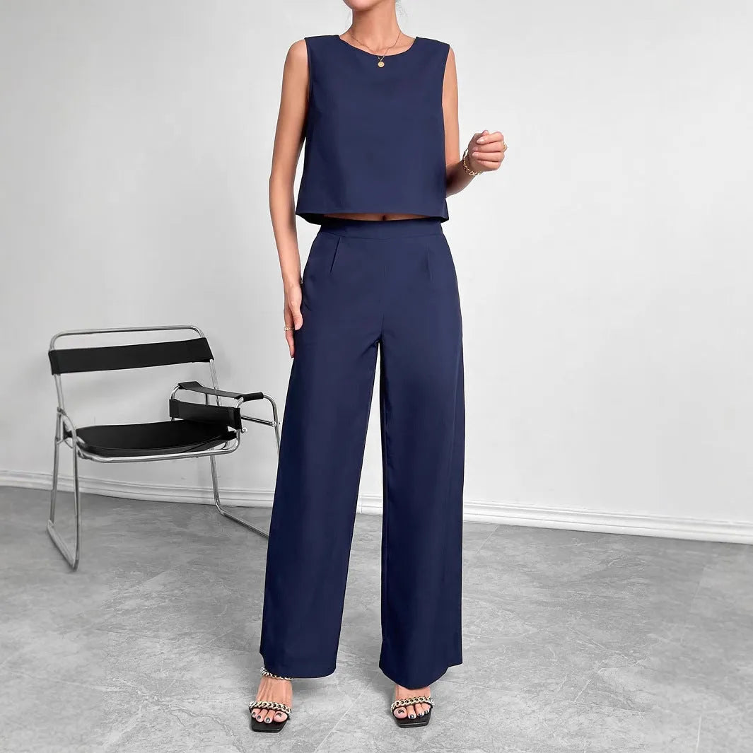 Red sleeveless top and wide-leg trousers two-piece set on a hanger.