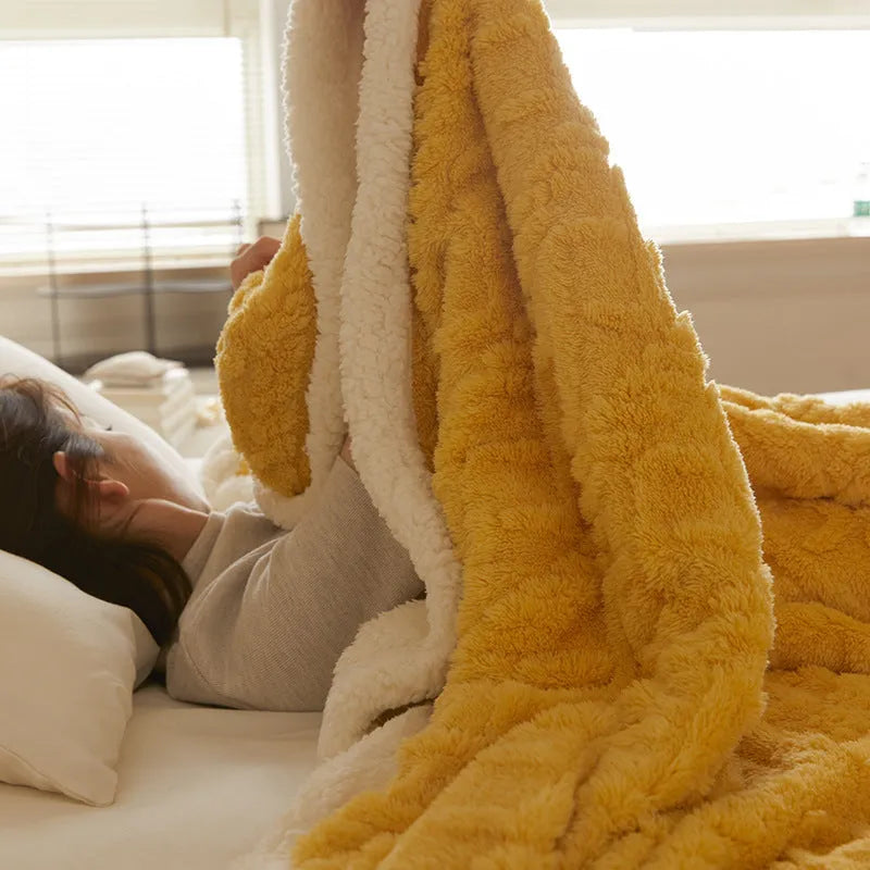 Polyester thermal flannel casual blanket in beige, shown folded, for winter bed or sofa use.