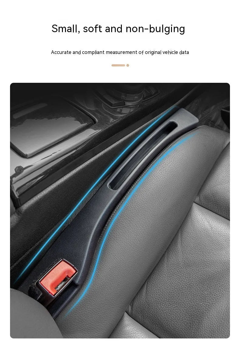 Black car seat gap storage box with handle between vehicle seats