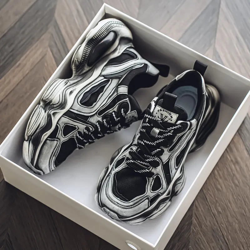 Men's black mesh sneakers with a platform sole and front lace-up closure on a white background.