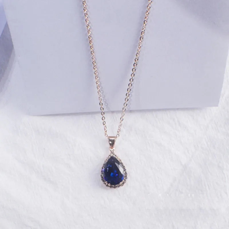 Drop-shape alloy necklace with rhinestone inlay available in eight electroplated colour finishes