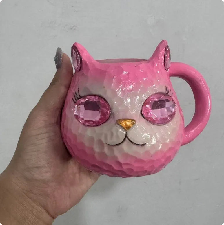 Handmade resin cat craft cup with hand-painted detailing in blue, green, pink, or purple.