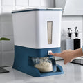 Automatic kitchen plastic rice bucket with metering lid, 5L to 6L capacity, in black and blue colour options