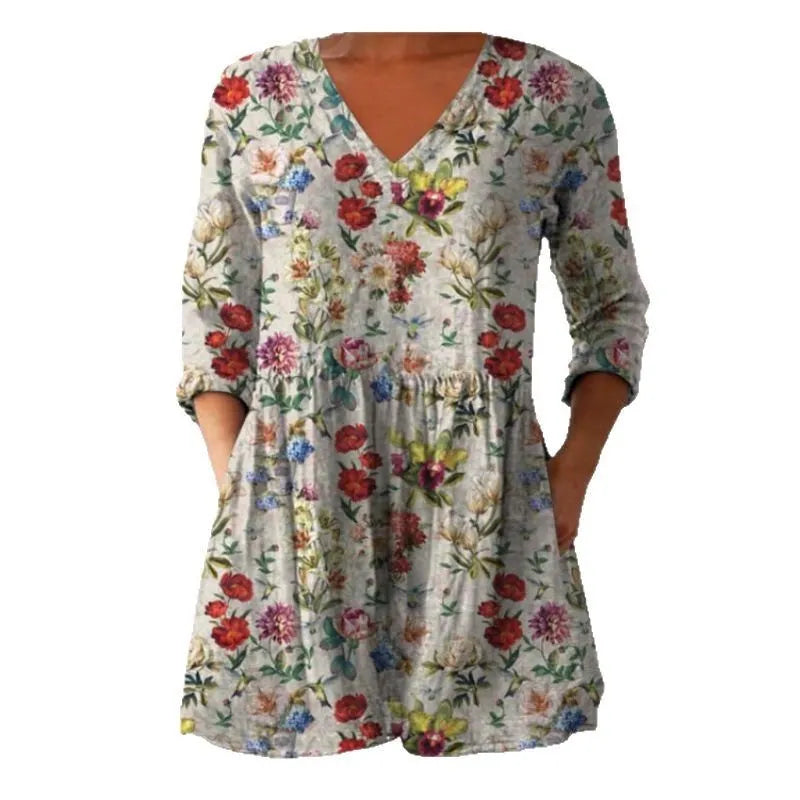 Women's printed loose dress with 3/4 sleeves and wide waist design in floral pattern