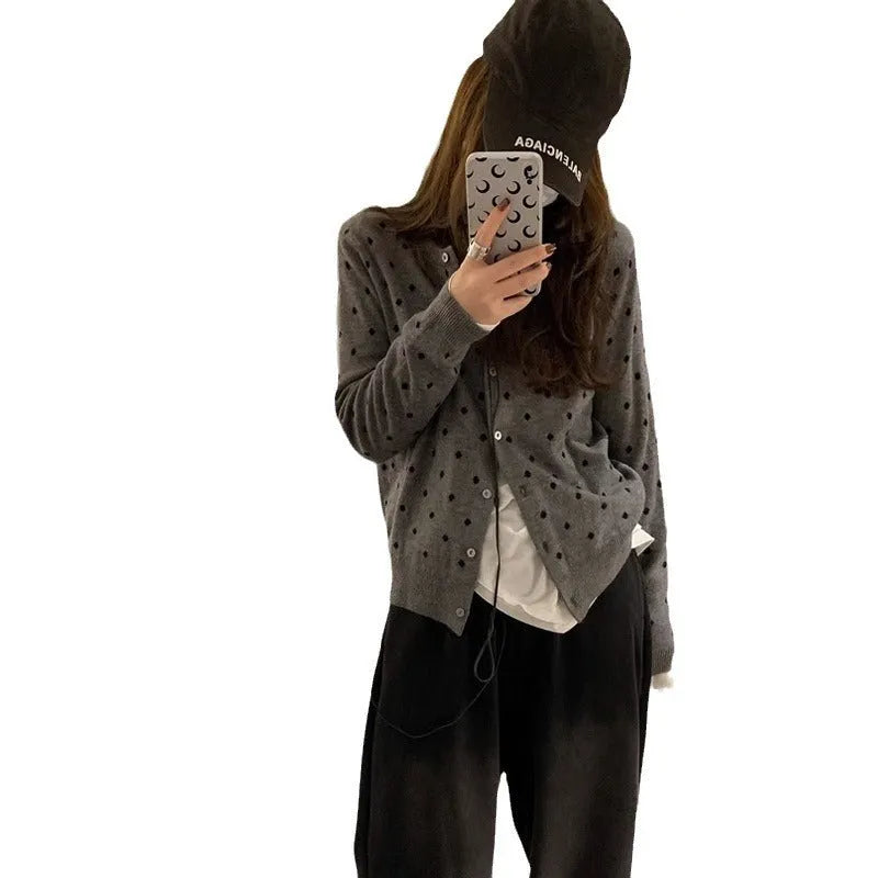 Women's grey knitted cardigan with crochet flower details, loose fit, long sleeves