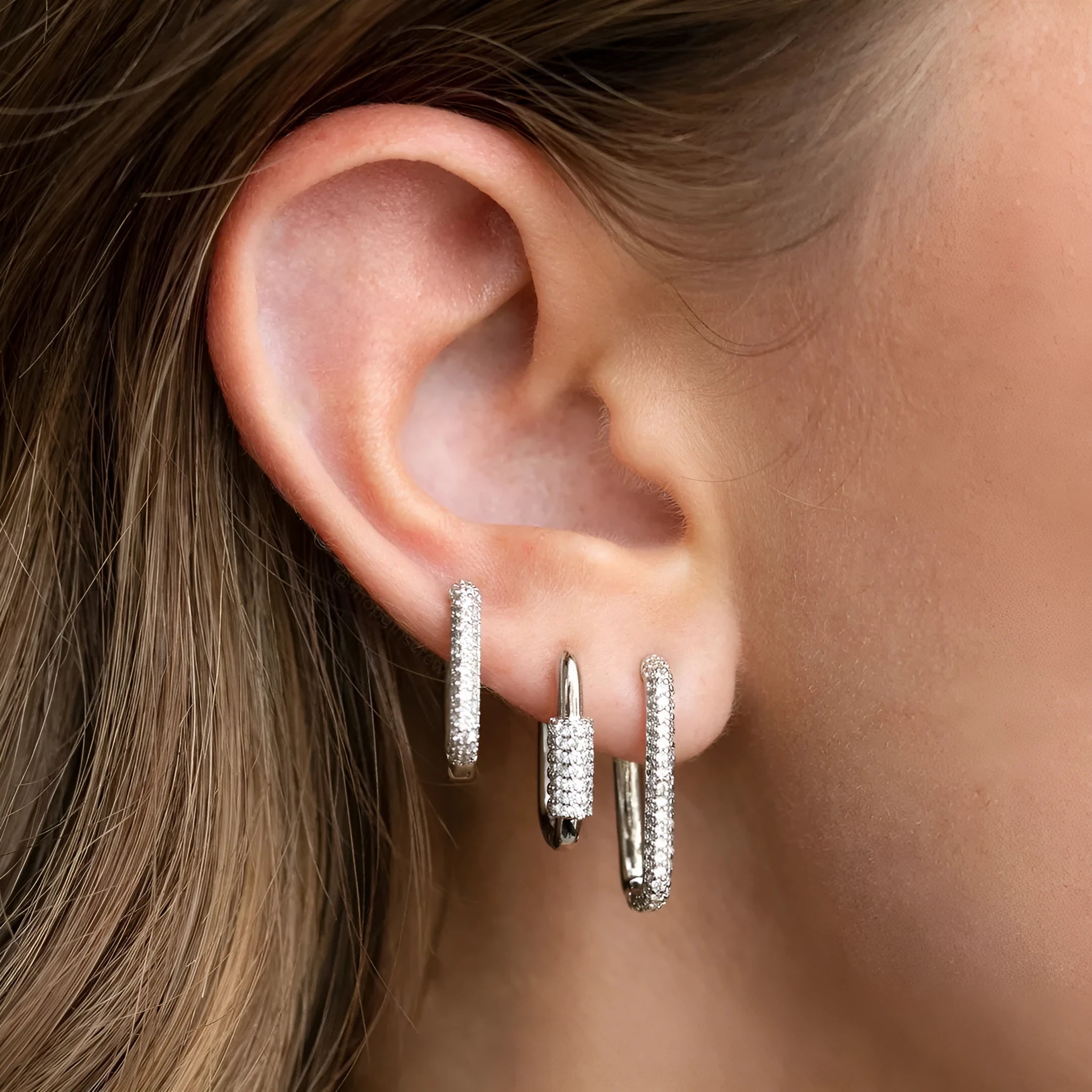 Three geometric ear clips with square design and micro inlaid zircon detailing in gold or white colour options