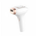 Pink and white three-in-one ice-sensing laser hair removal device with shaver and protective glasses