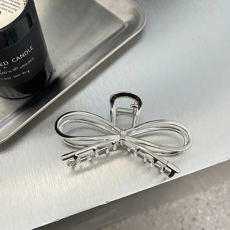 Alloy bow barrette for women Korean style hair grip in silver finish with manual polish