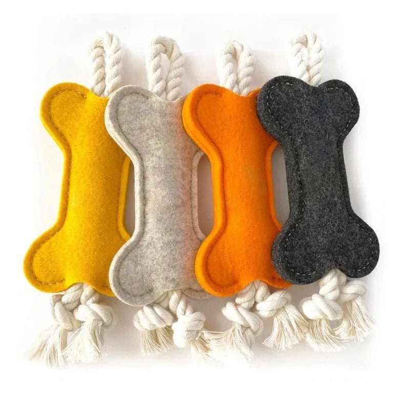 Bone-shaped dog toy with rope knot and felt construction in four colour options