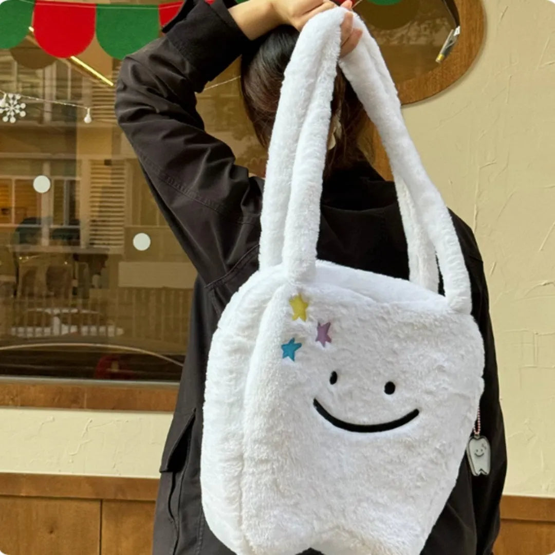 White plush large tooth shoulder tote bag with zipper closure and unisex design