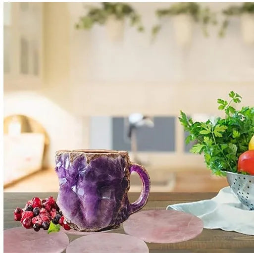 Purple resin coffee mug with 3D crystal texture and a handle on a wooden table.