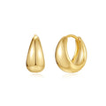 A pair of round, geometric brass earclip earrings with a gold electroplated finish.