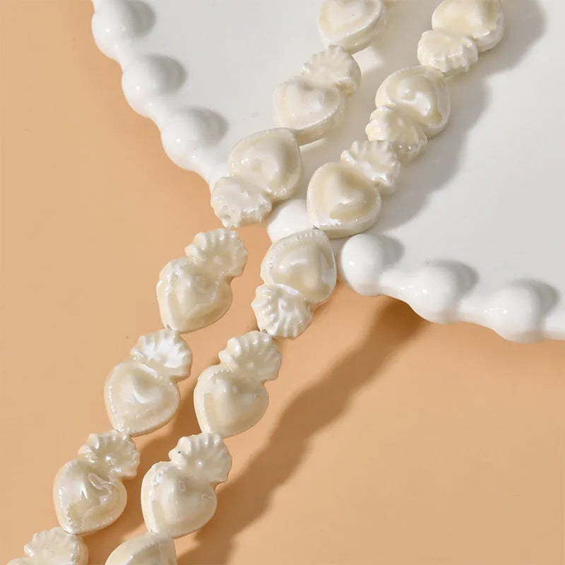 Ceramic love heart beads in assorted colours, 10x15mm size with straight 1.7mm hole