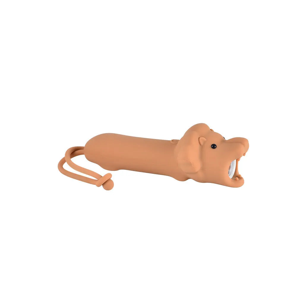 Four silicone animal toy flashlights in Blue Shark, Brown Lion, Brown Puppy, and Green Crocodile designs