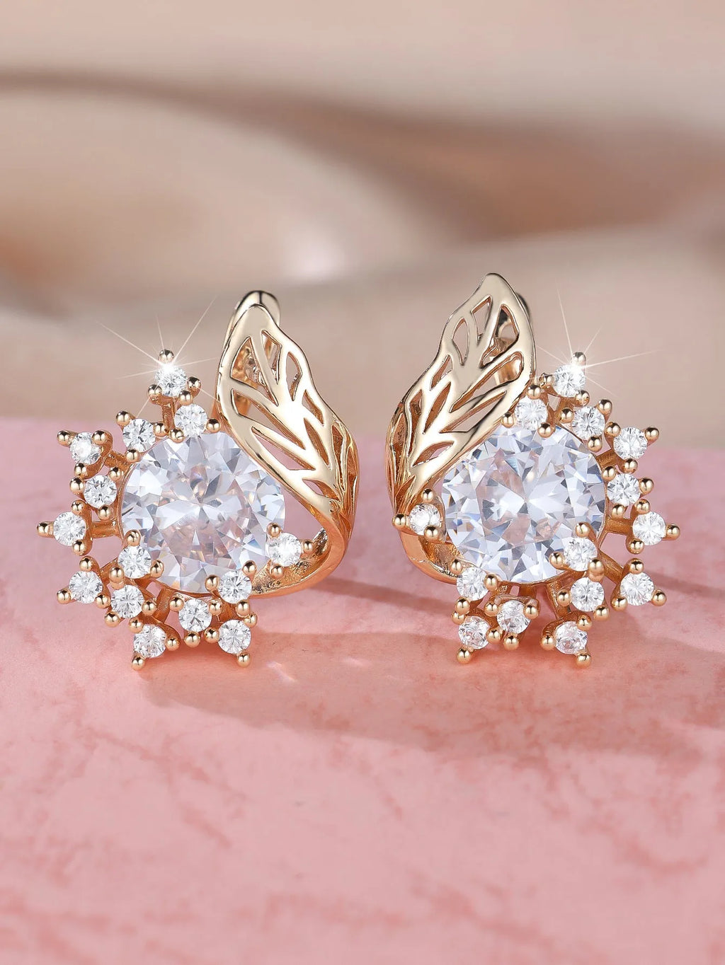 Round flower feather earrings with zircon stones in champagne gold finish, showing six colour variations