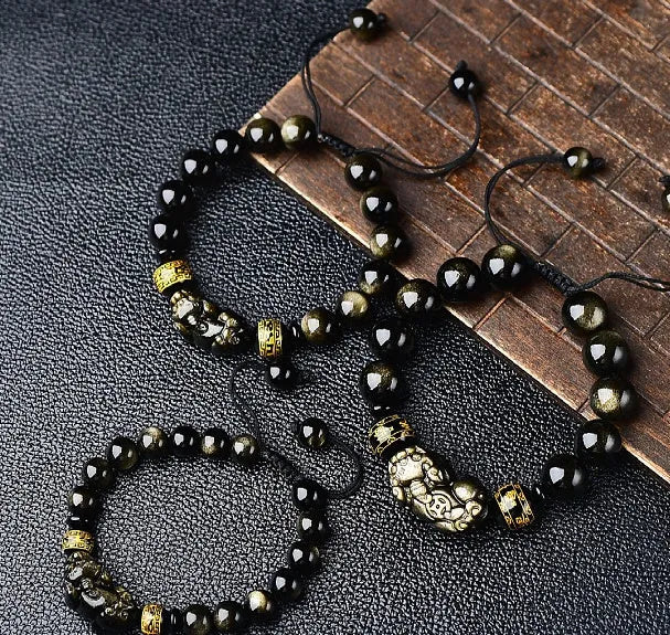Natural obsidian Pi Xiu bracelet with hand-woven cord and golden sheen on black beads
