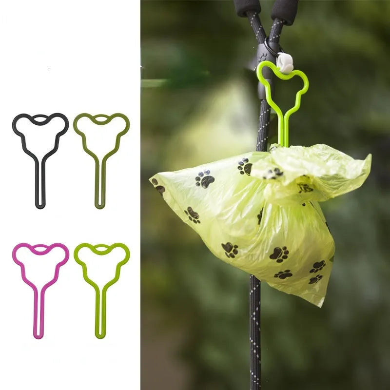 Dog poop bag holder with fixed clip and adjustable velcro strap for leash attachment