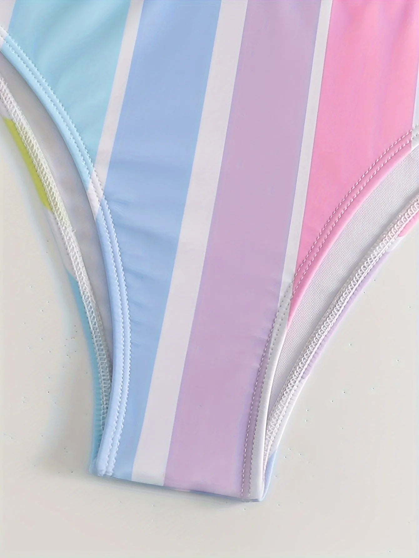 Women's striped bikini swimwear set with top and briefs for swimming and water sports
