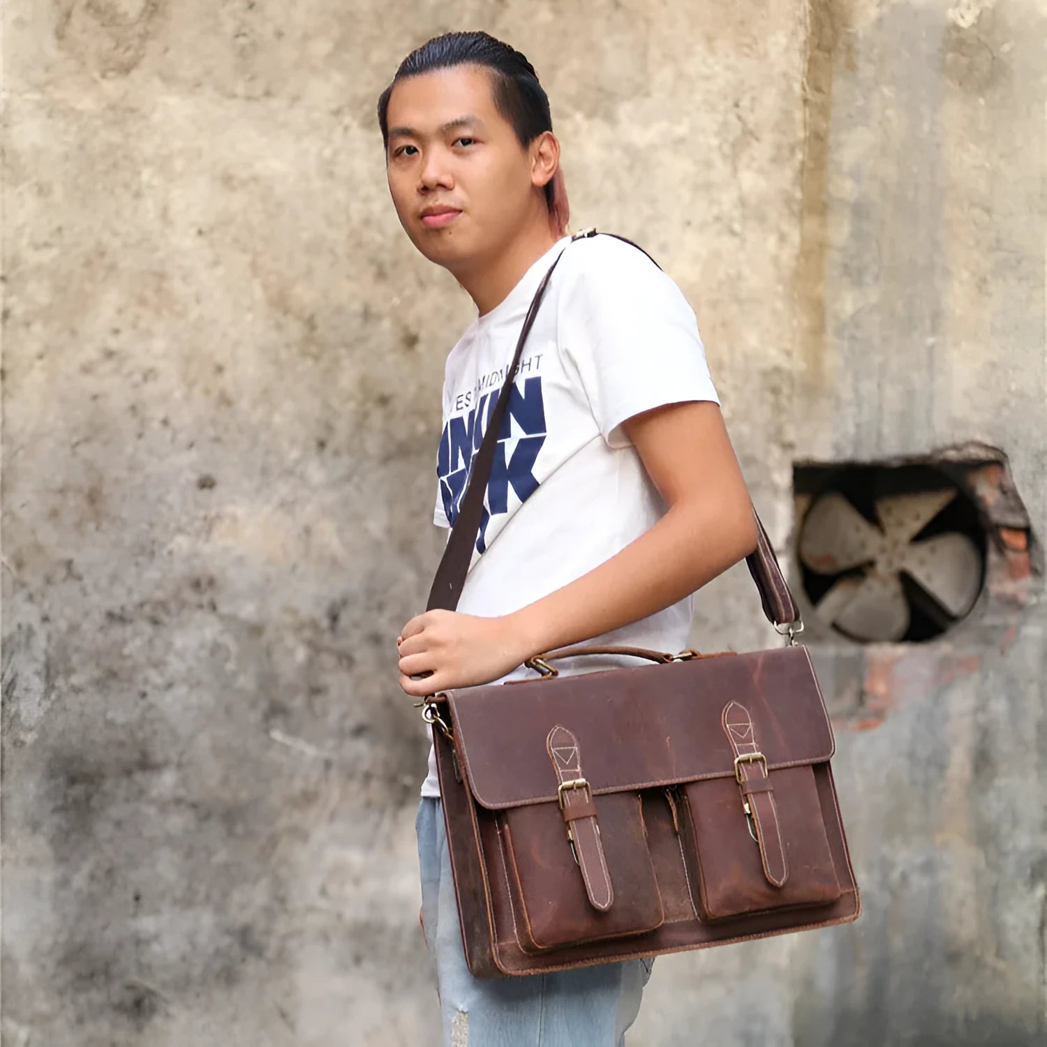 Small yellow brown Crazy Horse leather messenger bag for men with shoulder strap