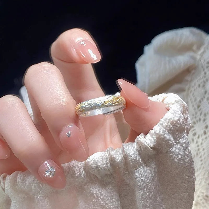 Xiangyun pattern open mouth ring with electroplated silver gold finish showing geometric fairy-style design