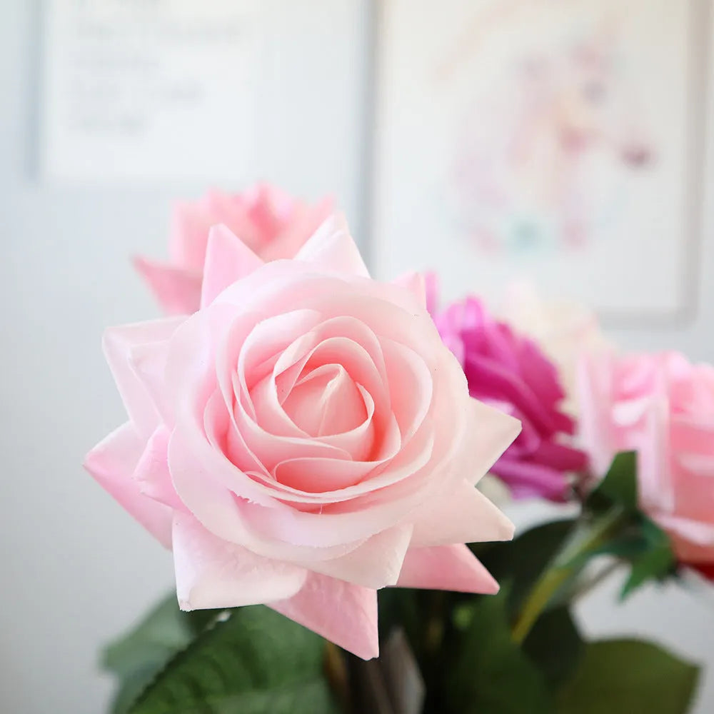 Artificial silk flower bouquet measuring approximately 42cm long with 8.5cm flower heads in multiple colour options