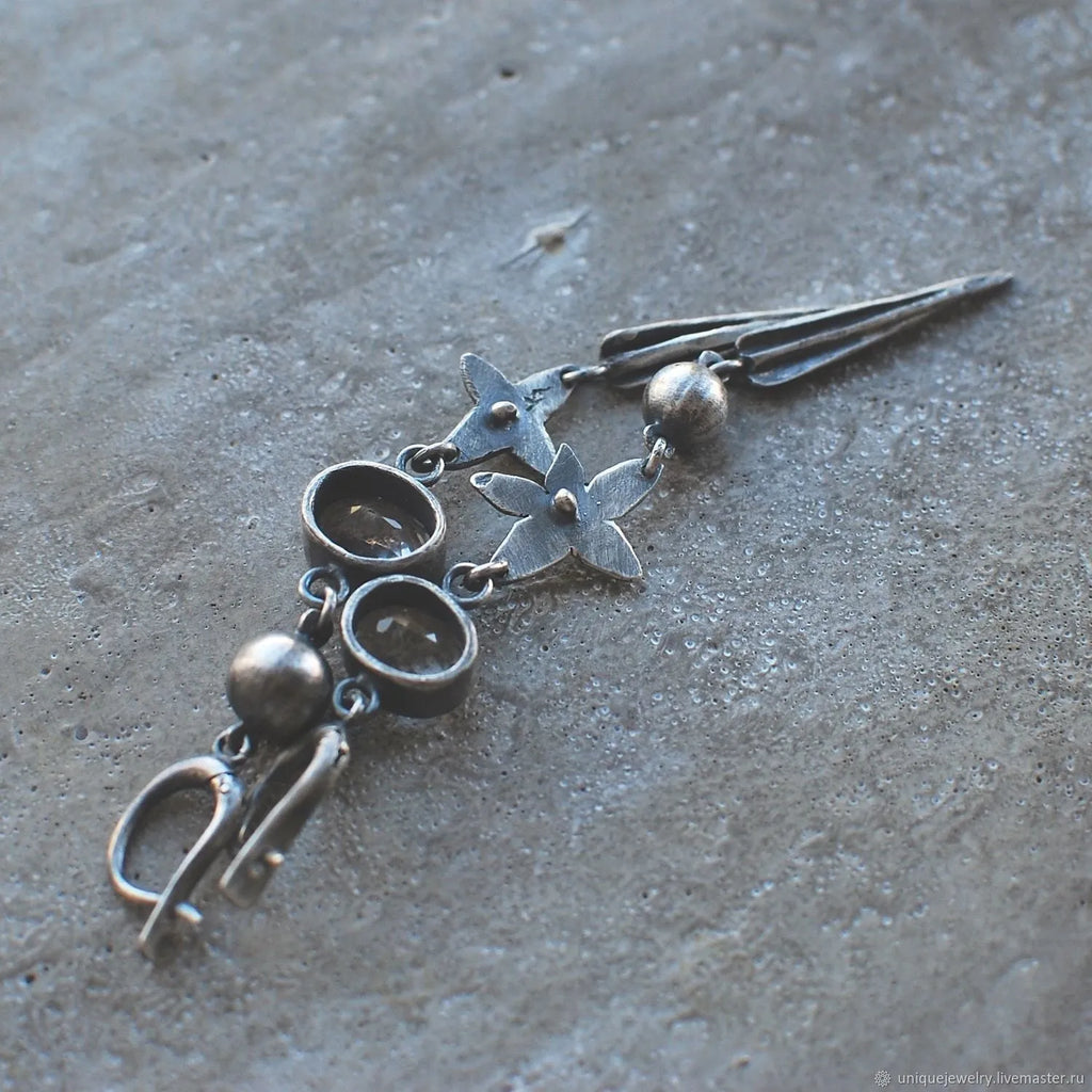 Hesheng antique silver geometric XINGX pendant earrings with rhinestone detailing and long drop design