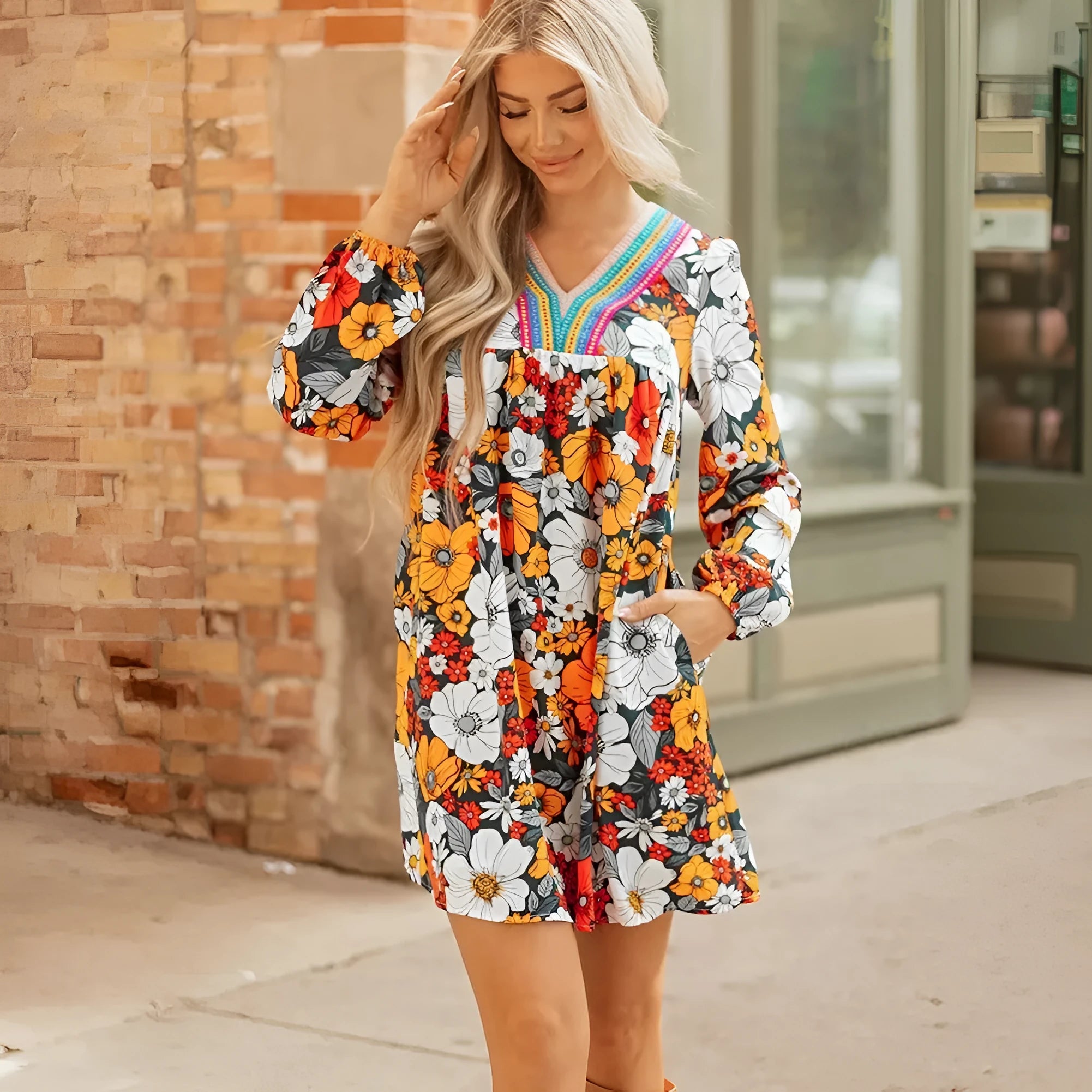 Orange floral print women's dress with striped lace sleeves and hem, V-neck long sleeve design.