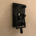 Retro decorative light switch plate with creative design for exposed wall installation.