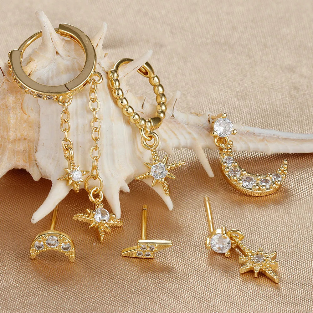 Six gold electroplated zircon stud earrings with chain tassel designs on copper base