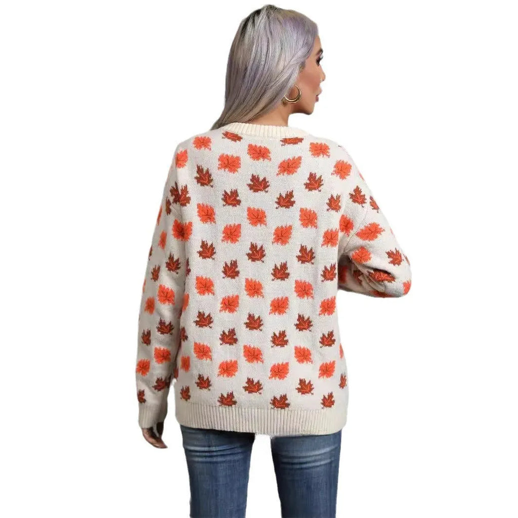 Women's beige loose fit polyester sweater with maple leaf contrast colour pattern and round neck