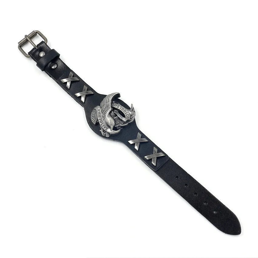 Black leather bracelet with geometric eagle watch-button clasp showing tapered 1.7-3.8cm width