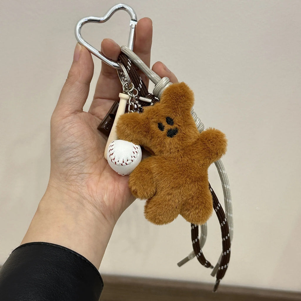 Plush brown bear doll pendant on a bag charm with soft fabric and small size