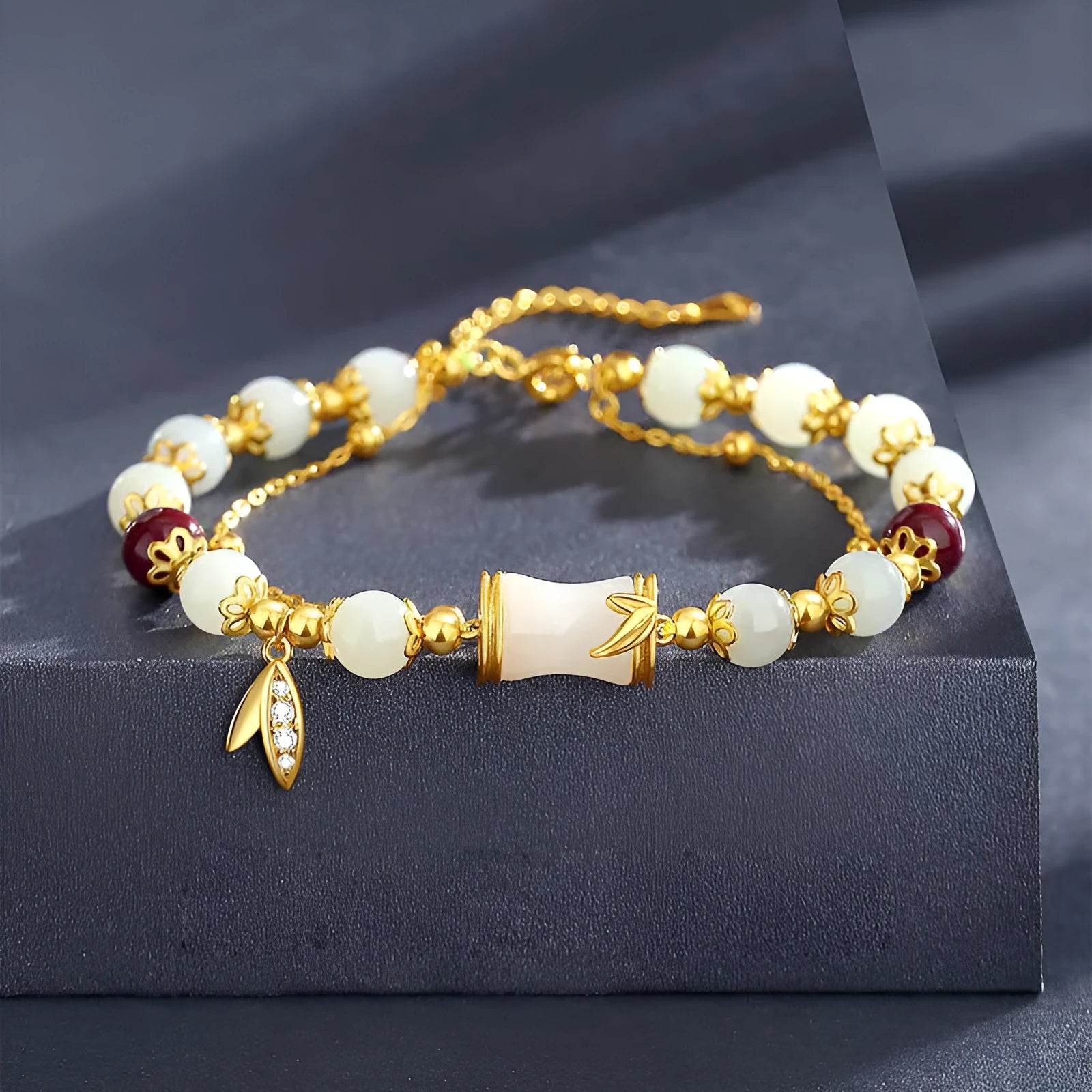 Retro unisex glass coloured glaze bracelet with flower-shaped Ruyi charm in green and electroplated finish