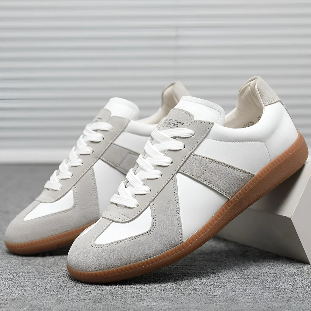White Japanese-style retro unisex board shoes with mesh upper, rubber sole, and contrast stitching