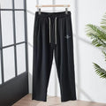 Men's ice silk thin breathable quick-drying casual pants in solid colour with drawstring high waist