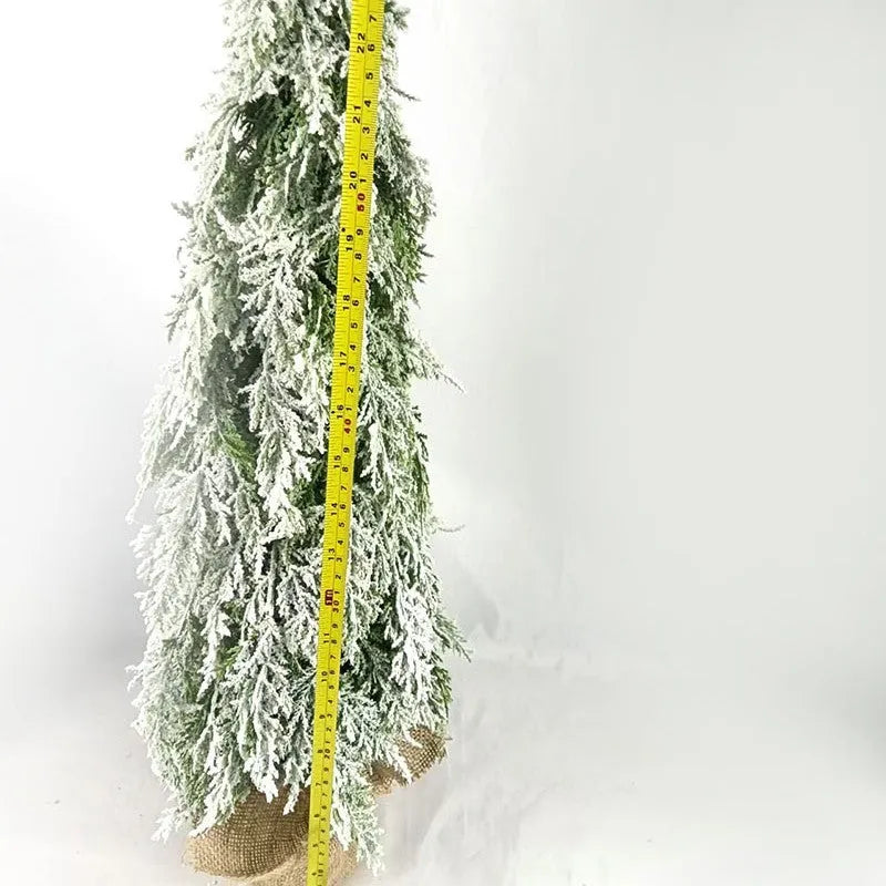 24-inch green PE plastic Christmas tree with lights and snow spray decoration on desktop