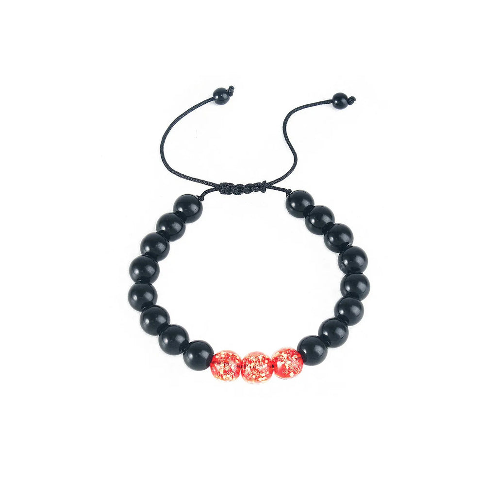 Beaded adjustable luminous bracelet in six colours: black, red, green, pink, blue, sapphire blue, glass or coloured glaze beads, geometric shape