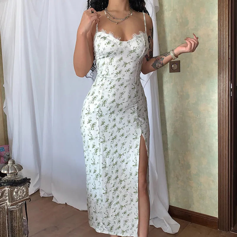 Blue lace floral print women's dress with suspender straps and a high thigh slit.