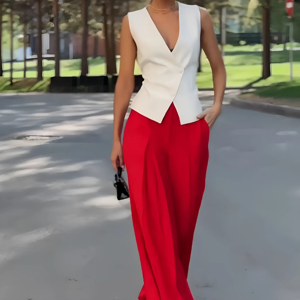 Women's beige deep V-neck sleeveless top and high waist wide leg pants two-piece set on model