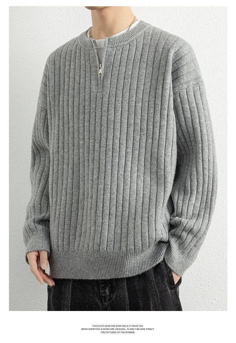 Men's grey half zip loose fit texture knitted sweater on a hanger.
