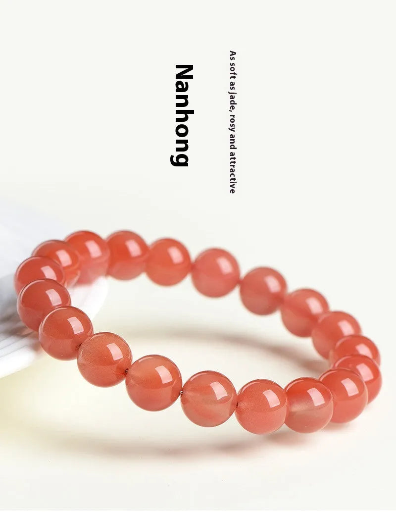 Natural cherry red agate scattered bead bracelet with polished stones.