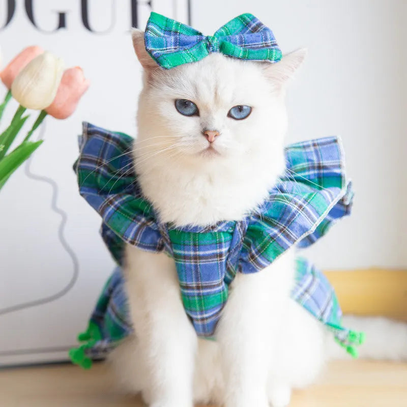 Red Christmas tartan pet skirt with matching bow tie and head flower on a cat, size M