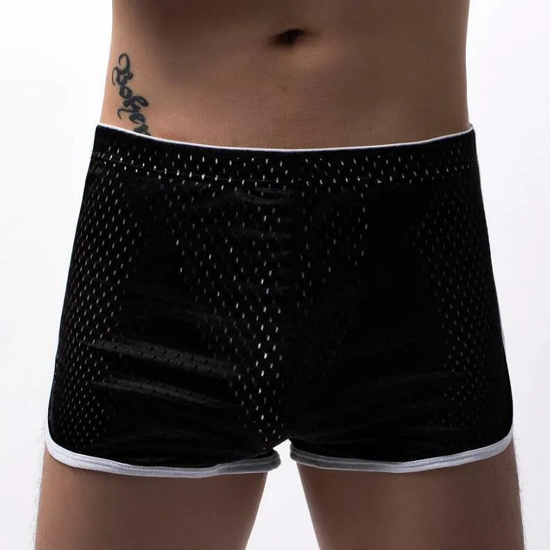 A pair of men's three-point boxer shorts in a cotton-nylon blend on a neutral background.