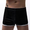 A pair of men's three-point boxer shorts in a cotton-nylon blend on a neutral background.
