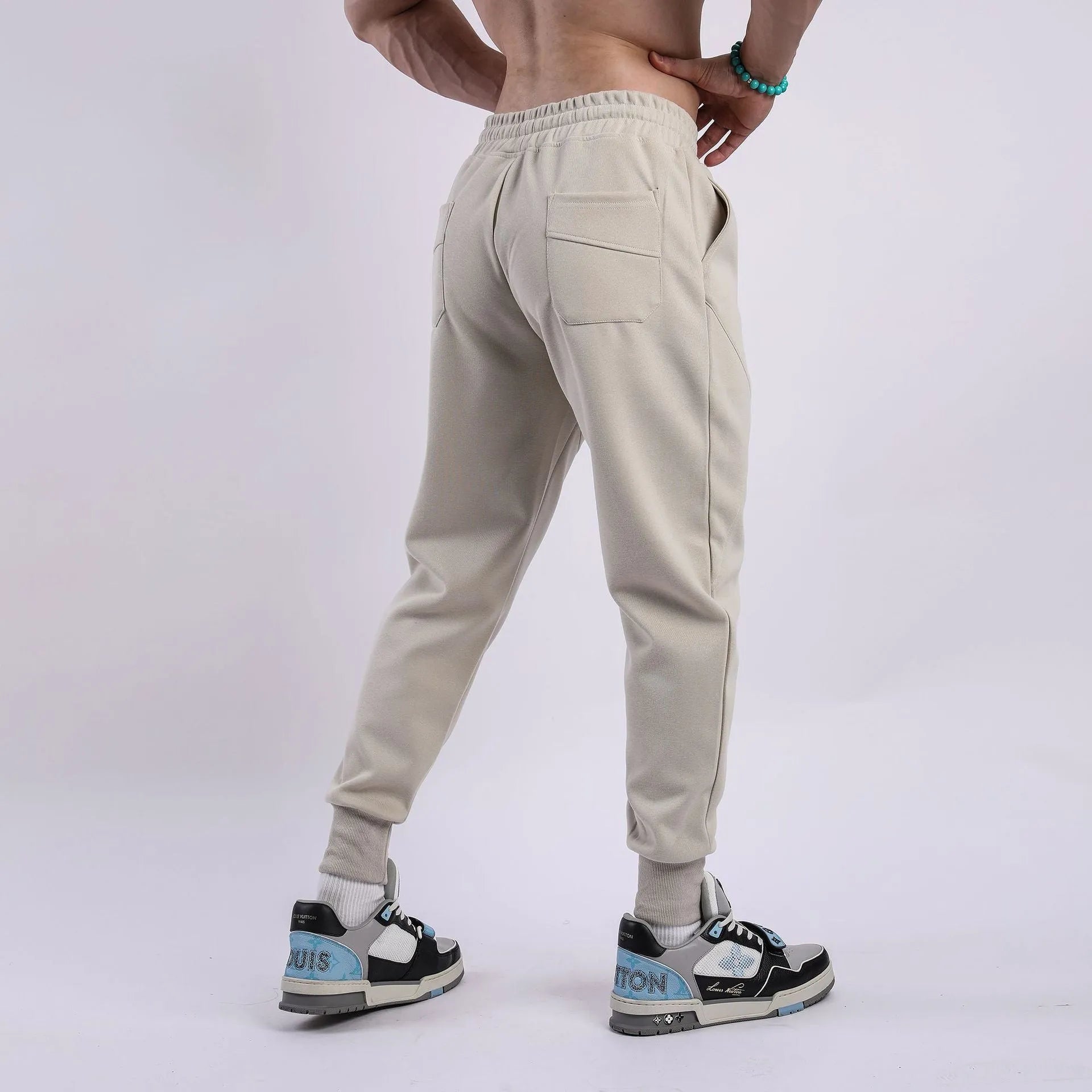 Men's casual ankle-tied drawstring sweatpants in polyester cotton elastic fabric, black colour