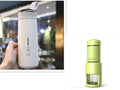 Portable manual espresso coffee machine in black, stainless steel, 7x7x20.3 cm