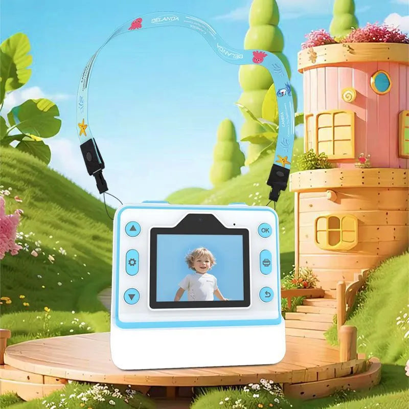 Children's dual lens printing camera in blue with ABS body, 94x56.8x89.2mm, showing front camera and lanyard