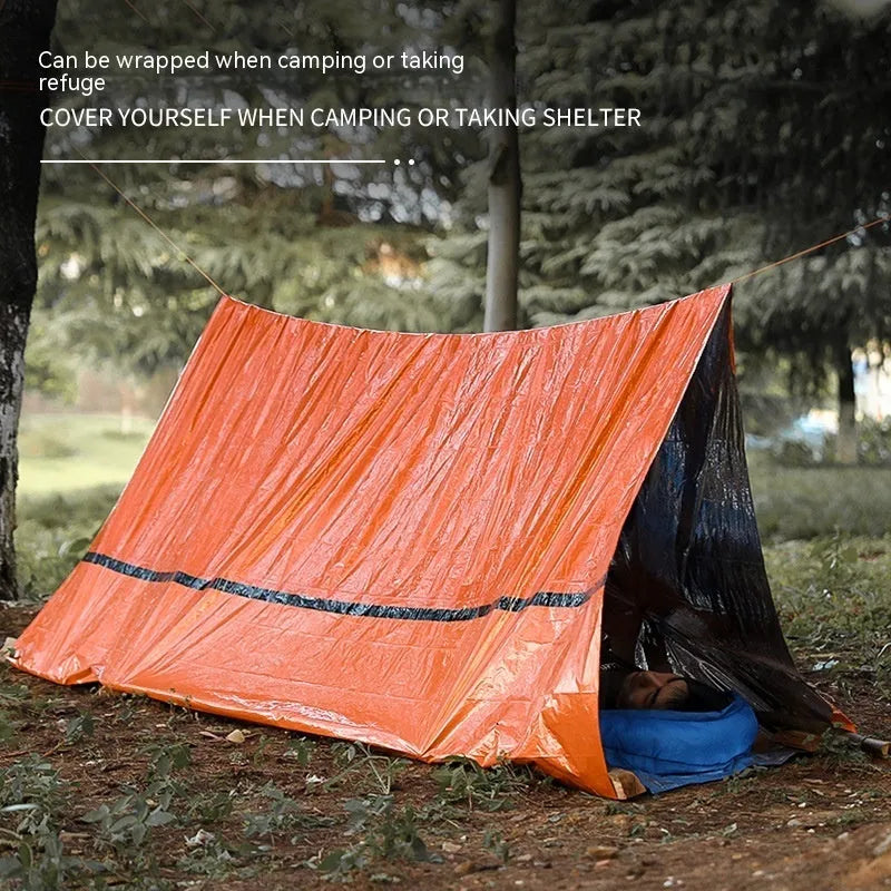 Portable orange disaster relief tent with sleeping bag and raincoat emergency shelter system