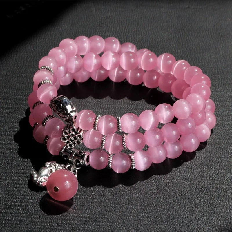 Crystal opal bracelet with 8mm cat eye bead and lucky cat charm in three-ring wrap design
